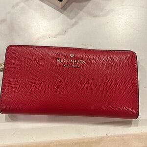 Red Kate Spade checkbook wallet never used great condition